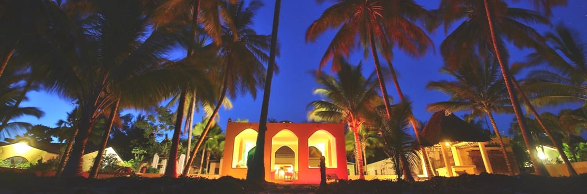 SawaSawa Beach House lit up at night
